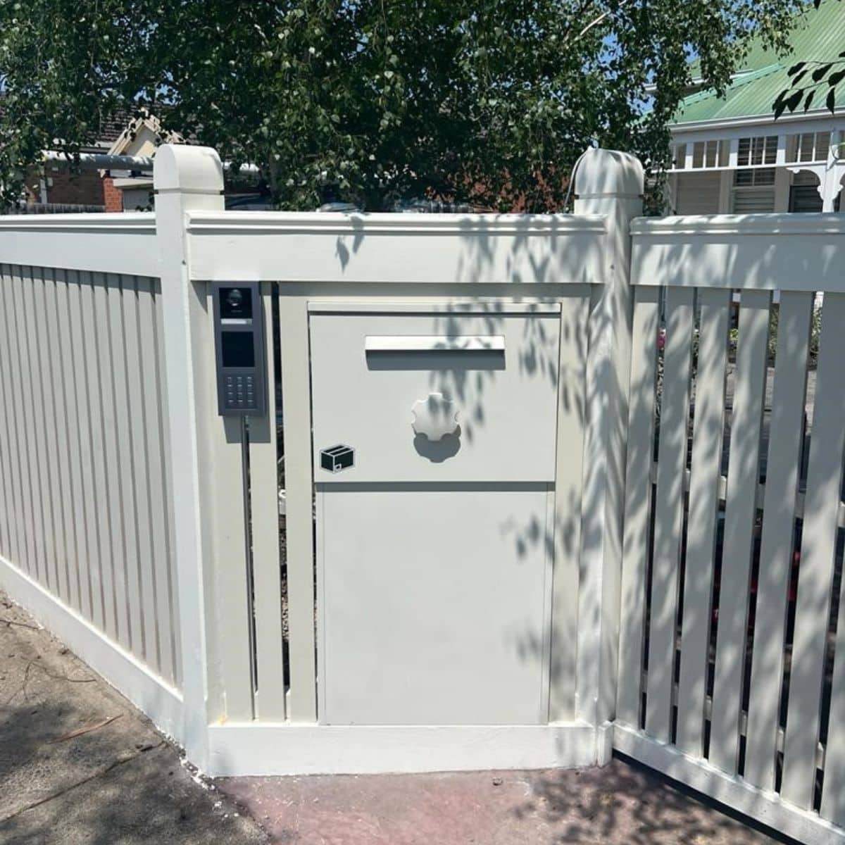 Extra-Large Parcel Letterbox built into fence. Recieves parcels and letters at the front and you collect deliveries from the rear. Ensuring your property is secure.